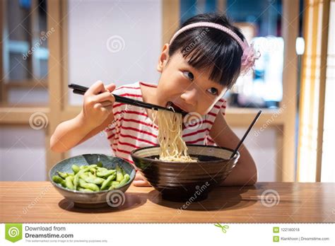 Asian Little Chinese Girl Eating Ramen Noodles Stock Photo Image Of