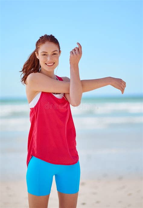 Beach Fitness And Woman Stretching Arms In Training To Warm Up Body