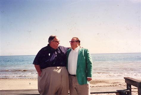 Chris Farley And His Dad In The 1990s At A Beach On Lake Michigan