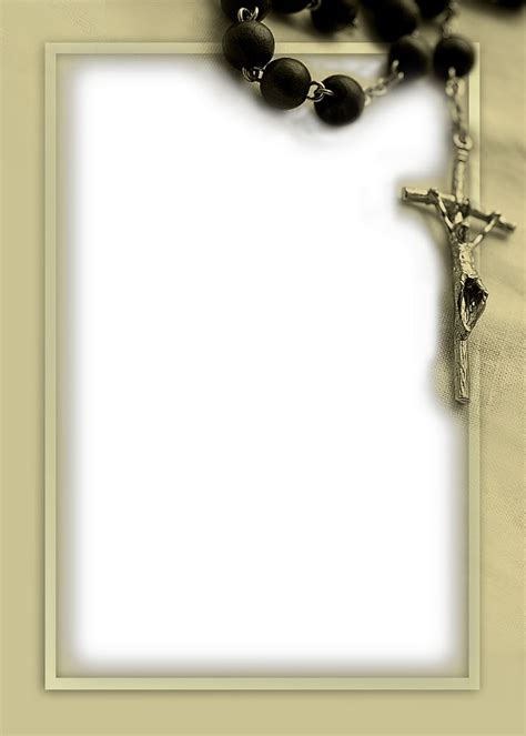 A Black Rosary With A White Frame On The Bottom And A Silver Crucifix