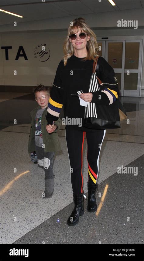 January Jones Departs From The Airport With Her Son Xander Dane Jones