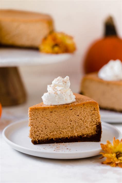 perfect pumpkin cheesecake with gingersnap crust plays well with butter