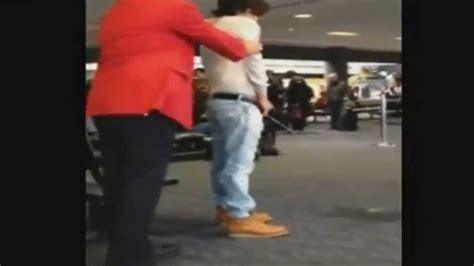 drunk dude peeing in airport doovi