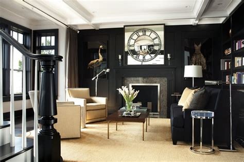 A gorgeous, super cool living room. The Most Brilliant Black And Gold Living Room Decor Ideas