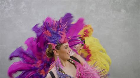 Free Stock Video Three Beautiful Showgirls Dancing They Wear Colourful Costumes
