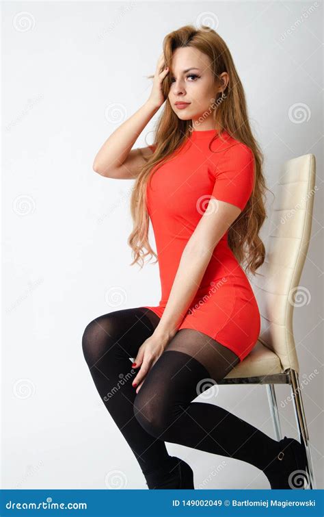 Girl With Red Dress Sits On Chair Stock Image Image Of Tights Sits 149002049