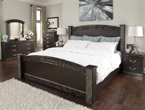 It is faux leather and quite a nice set. Silverglade Mansion Bedroom Set - mangaziez