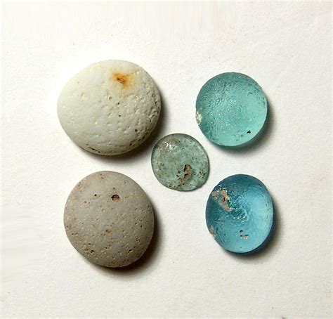 A Group Of Roman Glass Tesserae Or Gaming Tokens Ca 1st 4th Century A