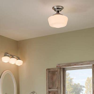 You can buy bathroom fans with lights at most big box stores such as lowe's or home depot. Bathroom Lighting at The Home Depot