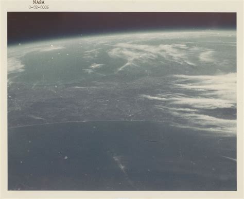 First human-taken photograph from space; Earth horizon over Florida and ...