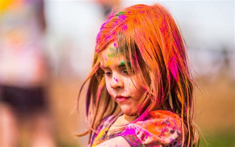 Beautiful Baby Child Girl Play With Colors On Holi Festival Of Colors