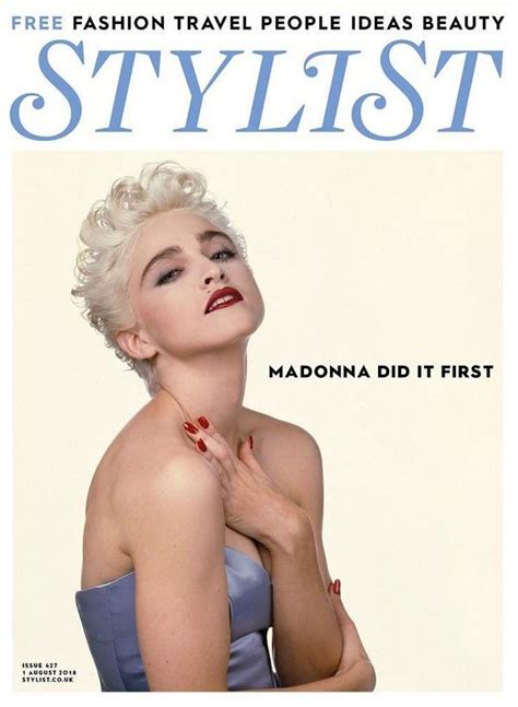 A Magazine Cover Featuring A Woman With White Hair And Red Nails On Her