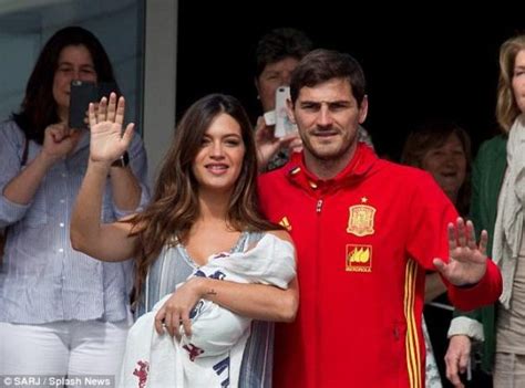 I am a football fan, every morning, the first page i opened is the sports page. Spain goalkeeper Iker Casillas and wife present their newborn child (photos)