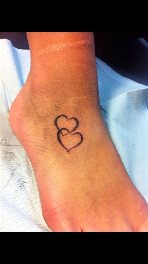 Interlocked Hearts Done By Stacy Heart Tattoo Tattoos Tattoo Shop