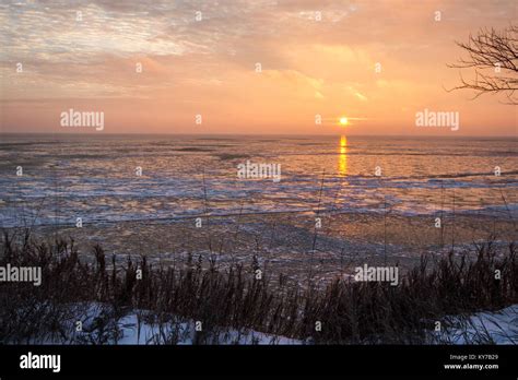 Frozen Winter Sunrise Landscape Scenic Sunrise Reflection Over The Icy