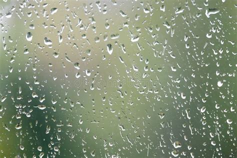 Background With Rain Droplets On Window Glass On Gloomy Autumn Day On