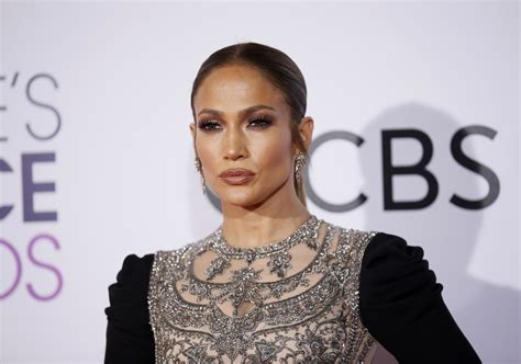 In Photos Jennifer Lopez Flaunts It All In Plunging Black Dress
