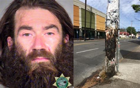portland man arrested after pushing 67 year old woman into traffic burning power pole biting