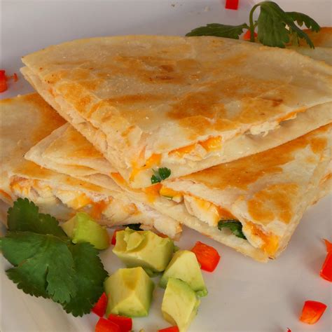 Add the filling, with cheese, to the tortilla and flip half the tortilla over the filling. Chicken quesadilla recipe - All recipes UK