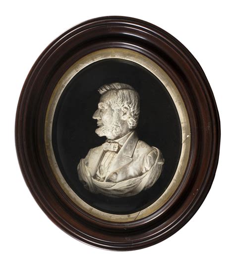 Lot - MOLDED WAX BUST OF ABRAHAM LINCOLN IN A VICTORIAN SHADOW BOX Painted white and gilt. Bust 