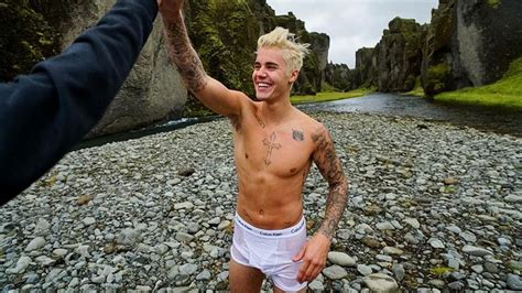 Justin Bieber Gets Nearly Naked Goes For An Ice Cold Swim In His Calvins Youtube