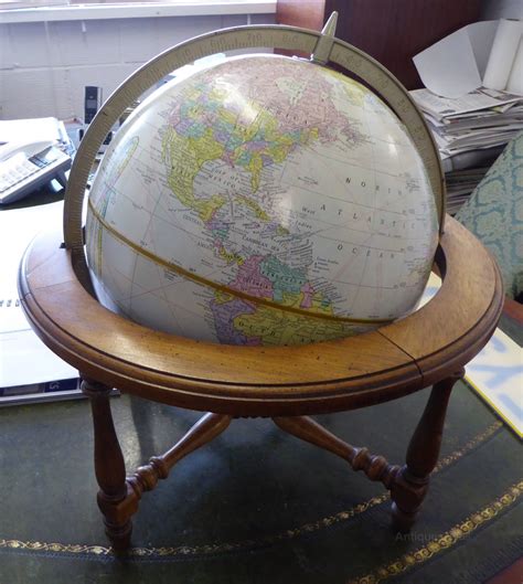 A good example of a 12' smiths terrestrial globe on a mahogany turned stand. Antiques Atlas - 12" Desk Globe By Cram