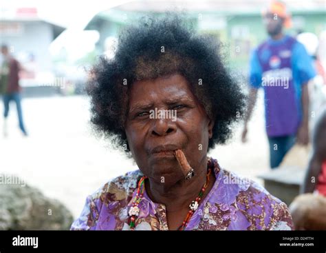 Woman Smoking At Buka Market Bougainville Papua New Guinea Stock