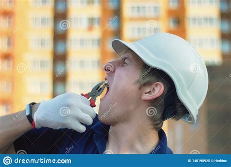 Man Pulls Tooth With Pliers Funny Builders Concept Stock Image Image Of Nippers Builder