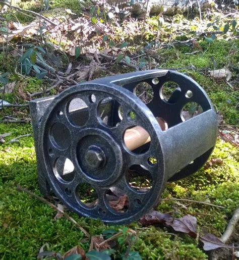 The weighted base is not easily moved or tilted over and the pleasing vertical design allows for the storage of five toilet/tissue paper rolls, one. Antique Fishing Reel Toilet Paper Holder
