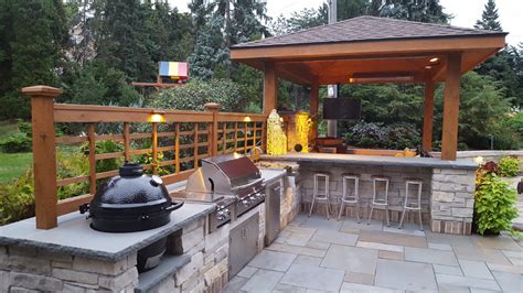 Now let's take a closer look at some actual ideas you can incorporate into your design. Outdoor Grill Stations and Kitchens - Traditional - Patio - Milwaukee - by LandCrafters, Inc