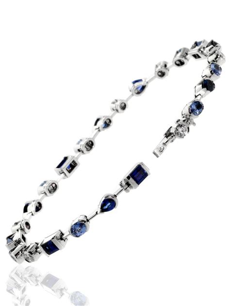 Cartier classic diamond line bracelet set in 18kt yellow gold. Cartier Meli Melo Ceylon Sapphire Diamond Gold Bracelet at ...