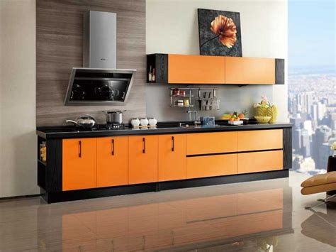 This Orange Laminate And Black Wood Combination Complement The Simple