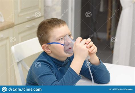 Boy Breathes With Inhaler Stock Image Image Of Sick 147302451