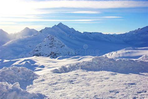 Snow Capped Peaks Of The Mountains Stock Photo Image Of Blue Mount