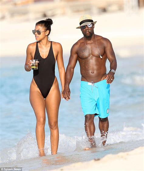 Kevin Hart Puffs On A Cigar On Romantic Beach Walk With Eniko Parrish