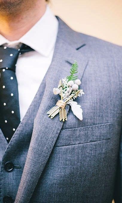 A Man In A Suit With A Boutonniere On His Lapel