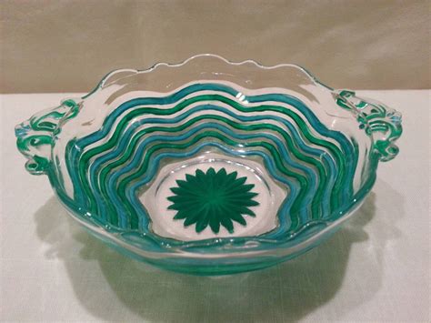 vintage blue and green wavy glass bowl with a scalloped edge