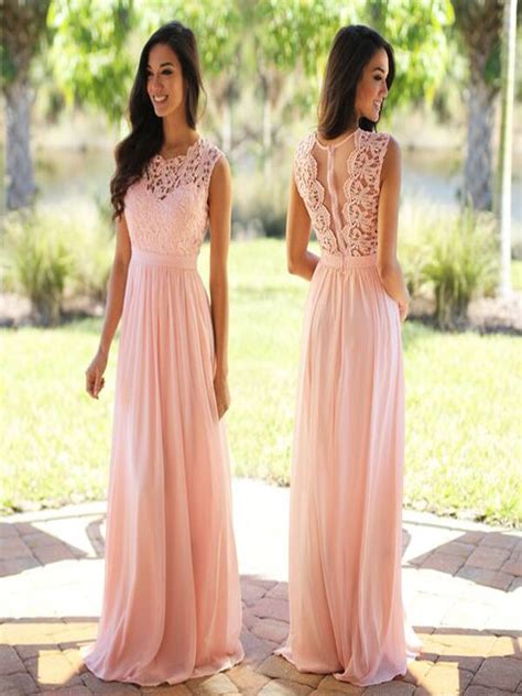 The blush color bridesmaid dress features o neckline with a chiffon ribbon tied to a bow, lace top continued with pleated waist, a line skirt finishing with floor length. Blush Pink lace bridesmaid dresses, long bridesmaid ...