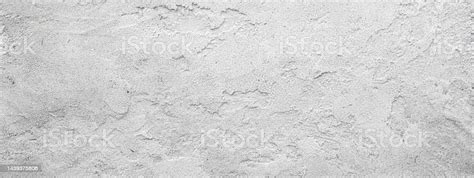 White Or Light Gray Rough Grainy Stone Wall Texture Background Stock