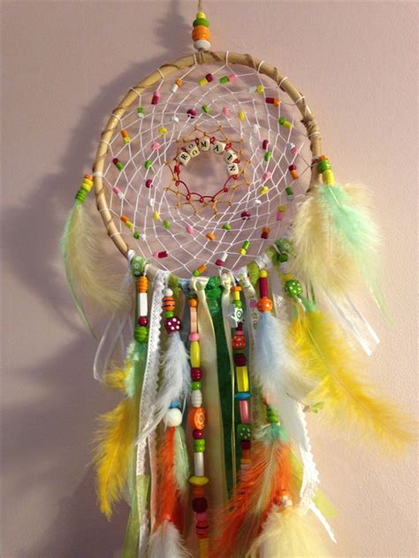 A Colorful Dream Catcher Hanging On The Wall