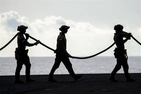 Sailors In Silhouette