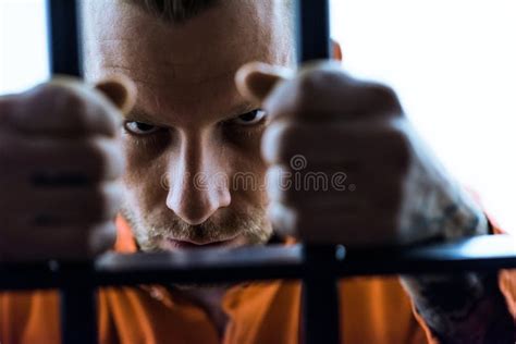 Aggressive Inmate Holding Prison Bars Unfairly Judged Court Sentence Appeal Stock Image