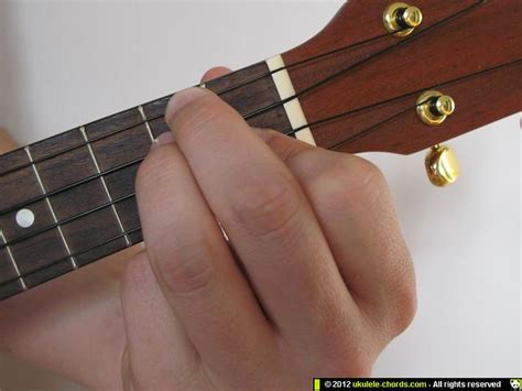 Get your grip around the ukulele's neck tight and firmly press each. Dm ukulele chord | How to play a Dm on the soprano. For ...