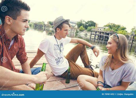 Friends Chilling Near Lake Stock Photo Image Of People 78981492