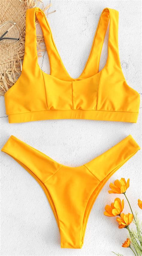 This Must Have Versatile Bikini Top Features A Scoop Collar Tank