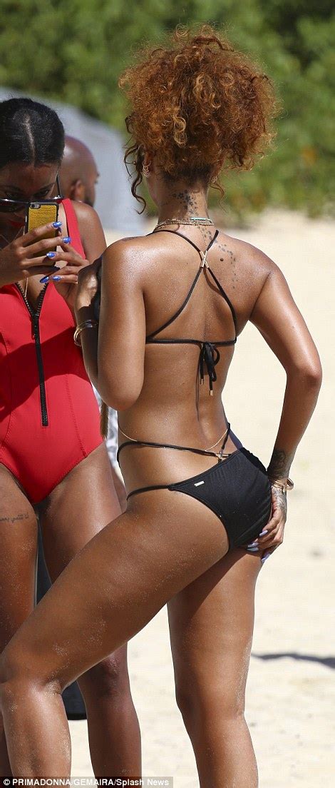 Rihanna Shows Off Her Beach Body In Cut Out Bikini In Barbados Daily Mail Online