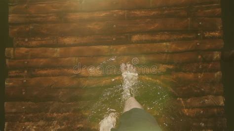 Male Bare Foot Stepping Over Underwater Pier In Summer Stock Footage