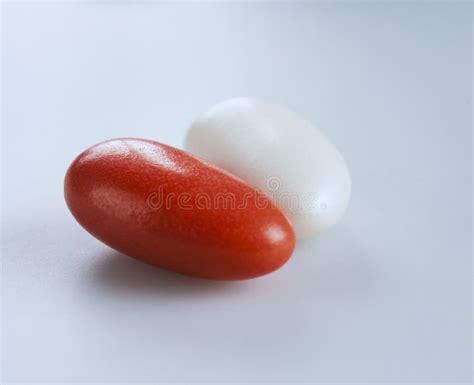 A Couple Of Red And White Candy Coated Almonds Stock Image Image Of