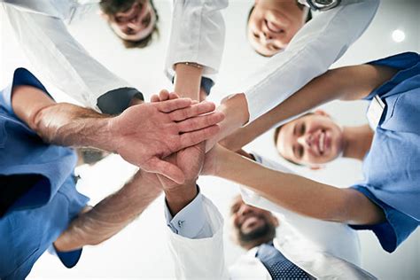 231900 Healthcare Teamwork Stock Photos Pictures And Royalty Free