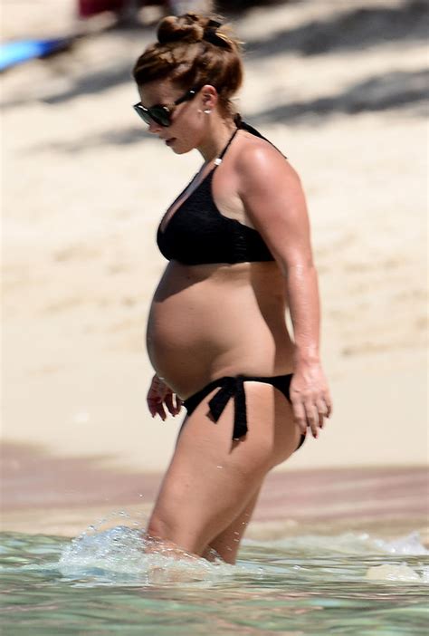 Coleen Rooney Pregnant Wag Shows Off Huge Baby Bump In Black Bikini Celebrity News Showbiz
